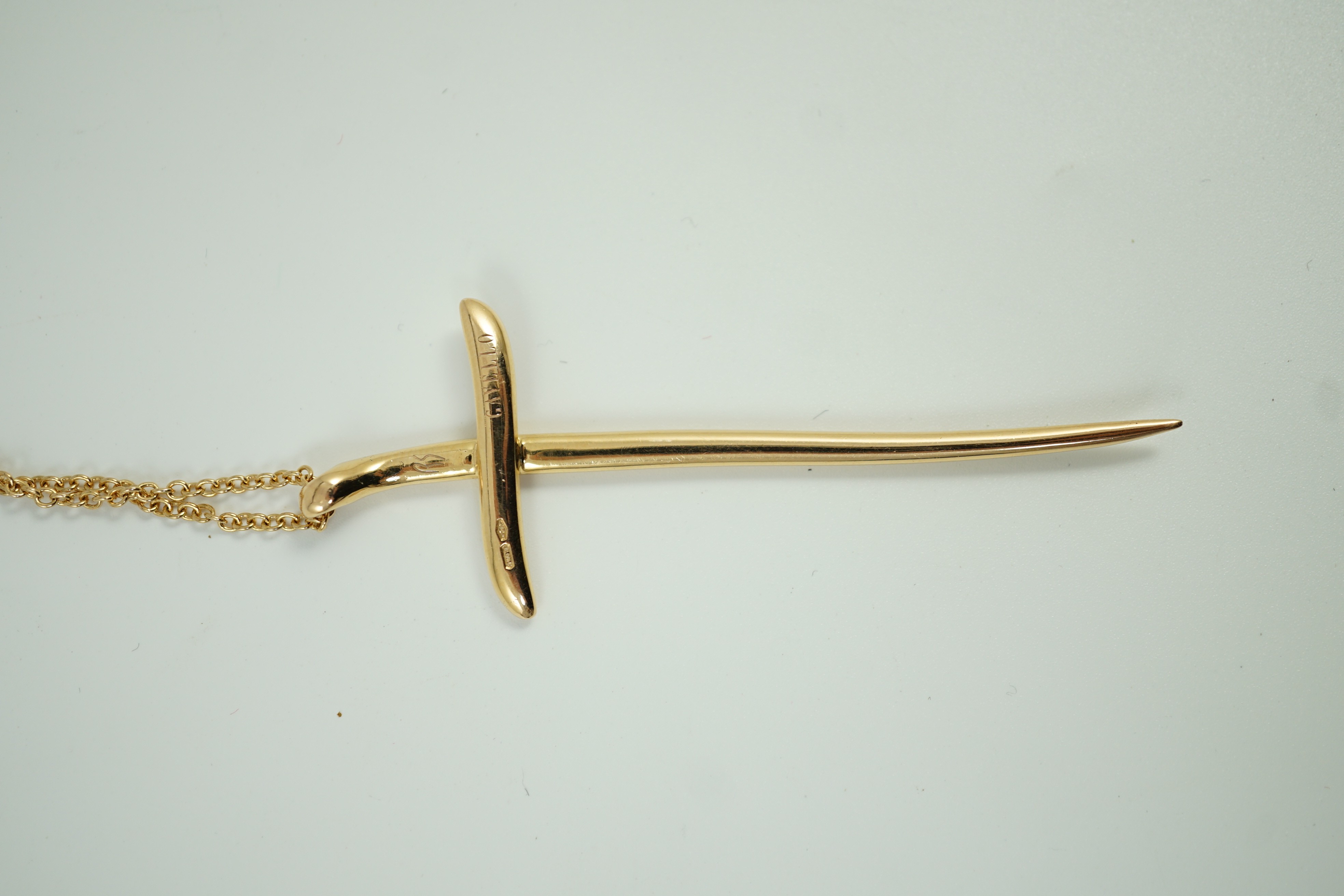 A modern Italian Gavello 750 yellow metal and pave set diamond cross pendant, 77mm, on a 750 yellow metal chain, 40cm, gross weight 14.5 grams.